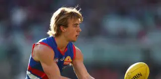 Western Bulldogs young gun makes contract call amid Tassie links MELBOURNE, AUSTRALIA - AUGUST 10: Ryley Sanders of the Bulldogs handballs during the round 22 AFL match between Melbourne Demons and Western Bulldogs at Melbourne Cricket Ground on August 10, 2025 in Melbourne, Australia. (Photo by Morgan Hancock/Getty Images)
