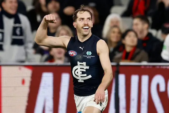 MELBOURNE, AUSTRALIA - AUGUST 21: Francis Evans of the Blues celebrates a goal during the 2025 AFL Round 24 match between the Essendon Bombers and the Carlton Blues at the Melbourne Cricket Ground on August 21, 2025 in Melbourne, Australia. (Photo by Michael Willson/AFL Photos via Getty Images)
