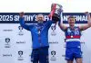 MELBOURNE, AUSTRALIA - SEPTEMBER 21: Stewart Edge, Senior Coach of the Bulldogs and Daniel Orgill of the Bulldogs hold the premiership cup aloft after winning the VFL Grand Final match between Footscray Bulldogs and Southport Sharks at Ikon Park on September 21, 2025 in Melbourne, Australia. (Photo by Josh Chadwick/AFL Photos/via Getty Images)