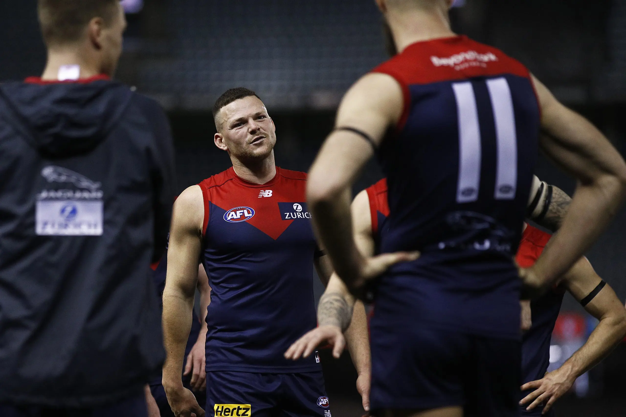 MELBOURNE, AUSTRALIA - AUGUST 01: Steven May of the Demons speaks with Max Gawn of the Demons after winning the round 20 AFL match between Gold Coast Suns and Melbourne Demons at Marvel Stadium on August 01, 2021 in Melbourne, Australia. (Photo by Daniel Pockett/Getty Images)