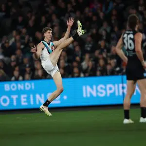 MELBOURNE , AUSTRALIA - AUGUST 16: Jack Whitlock of the Power kicks his first goal during the 2025 AFL Round 23 match between the Carlton Blues and the Port Adelaide Power at Marvel Stadium on August 16, 2025 in Melbourne, Australia. (Photo by James Wiltshire/AFL Photos via Getty Images)