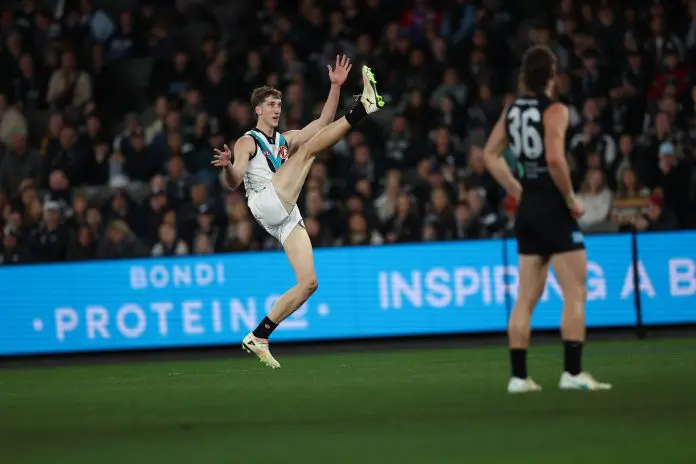 MELBOURNE , AUSTRALIA - AUGUST 16: Jack Whitlock of the Power kicks his first goal during the 2025 AFL Round 23 match between the Carlton Blues and the Port Adelaide Power at Marvel Stadium on August 16, 2025 in Melbourne, Australia. (Photo by James Wiltshire/AFL Photos via Getty Images)