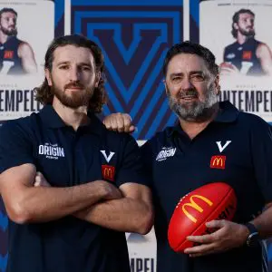 MELBOURNE, AUSTRALIA - NOVEMBER 14: Marcus Bontempelli of the Bulldogs and Garry Lyon, Victorian Chair of Selectors pose during the State of Origin Media Opportunity at Marvel Stadium on November 14, 2025 in Melbourne, Australia. (Photo by Michael Willson/AFL Photos via Getty Images)