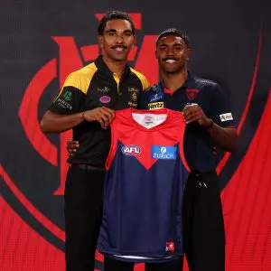MELBOURNE, AUSTRALIA - NOVEMBER 19: Latrelle Pickett (Glenelg) poses with Kysaiah Pickett of the Demons after being drafted with pick 12 by the Melbourne Demons during the 2025 Telstra AFL Draft at Marvel Stadium on November 19th, 2025 in Melbourne, Australia. (Photo by James Wiltshire/AFL Photos via Getty Images)