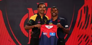 MELBOURNE, AUSTRALIA - NOVEMBER 19: Latrelle Pickett (Glenelg) poses with Kysaiah Pickett of the Demons after being drafted with pick 12 by the Melbourne Demons during the 2025 Telstra AFL Draft at Marvel Stadium on November 19th, 2025 in Melbourne, Australia. (Photo by James Wiltshire/AFL Photos via Getty Images)