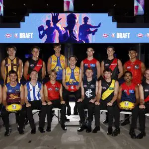 MELBOURNE, AUSTRALIA - NOVEMBER 19: First round picks (Top Row L-R) Cameron Nairn of the Hawks, Sullivan Robey of the Bombers, Cooper Duff-Tytler of the Eagles, Xavier Taylor of the Demons, Jacob Farrow of the Bombers, Dylan Patterson of the Suns, Willem Duursma of the Eagles (C) (Bottom Row L-R) Sam Grlj of the Tigers, Daniel Annable of the Lions, Lachy Dovaston of the Kangaroos, Zeke Uwland of the Suns, Harry Dean of the Blues, Sam Cumming of the Tigers, Latrelle Pickett of the Demons and Dyson Sharp of the Bombers pose during the 2025 Telstra AFL Draft at Marvel Stadium on November 19th, 2025 in Melbourne, Australia. (Photo by Michael Willson/AFL Photos via Getty Images)
