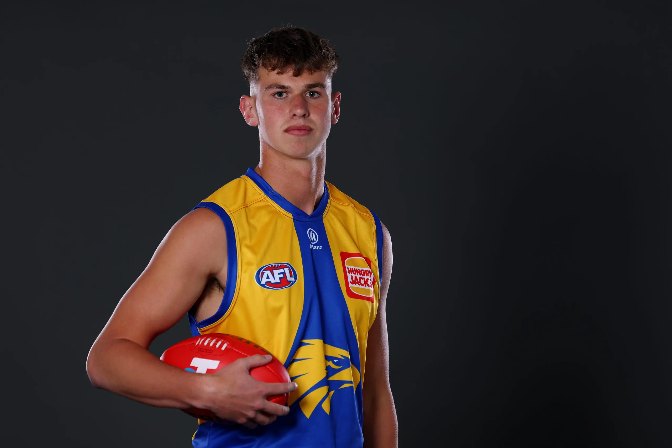 MELBOURNE, AUSTRALIA - NOVEMBER 19: Cooper Duff-Tytler poses after being selected by the Eagles as part of the 2025 Telstra AFL Draft at Marvel Stadium on November 19, 2025 in Melbourne, Australia. (Photo by Morgan Hancock/Getty Images)