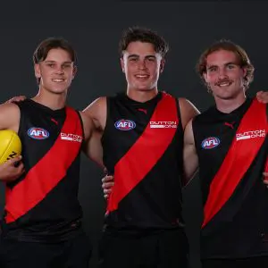 MELBOURNE, AUSTRALIA - NOVEMBER 19: Jacob Farrow, Sullivan Robey and Dyson Sharp pose after being selected by the Bombers as part of the 2025 Telstra AFL Draft at Marvel Stadium on November 19, 2025 in Melbourne, Australia. (Photo by Morgan Hancock/Getty Images)