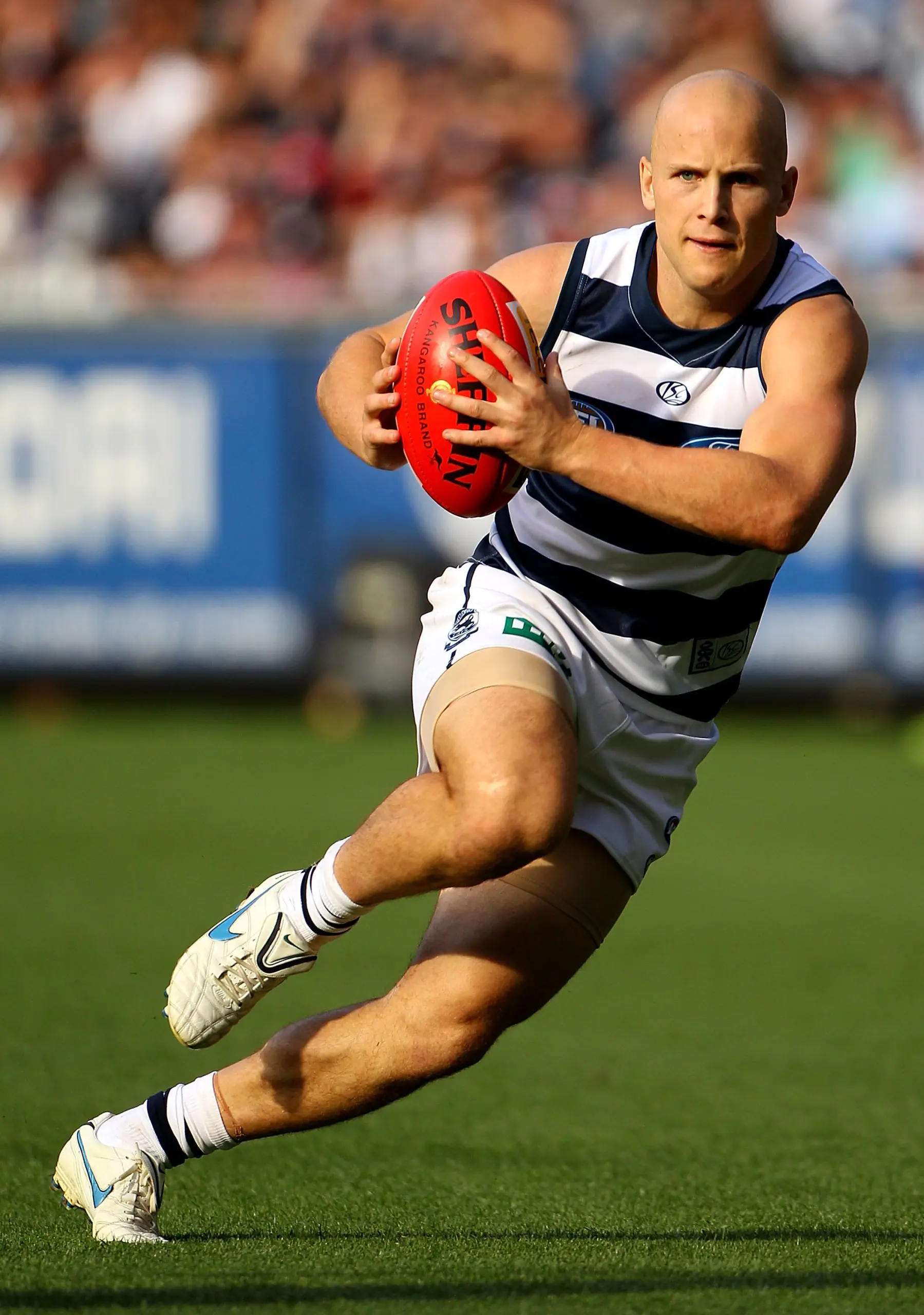 MELBOURNE, AUSTRALIA - APRIL 26: Gary Ablett of the Cats gathers the ball during the round five AFL match between the Carlton Blues and the Geelong Cats at Melbourne Cricket Ground on April 26, 2010 in Melbourne, Australia. (Photo by Mark Dadswell/Getty Images)
