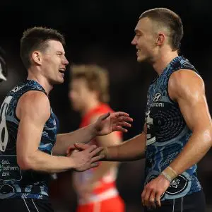 MELBOURNE, AUSTRALIA - MAY 20: Patrick Cripps of the Blues celebrates with Sam Walsh of the Blues after the Blues defeated the Swans during the round 10 AFL match between the Carlton Blues and the Sydney Swans at Marvel Stadium on May 20, 2022 in Melbourne, Australia. (Photo by Robert Cianflone/Getty Images)