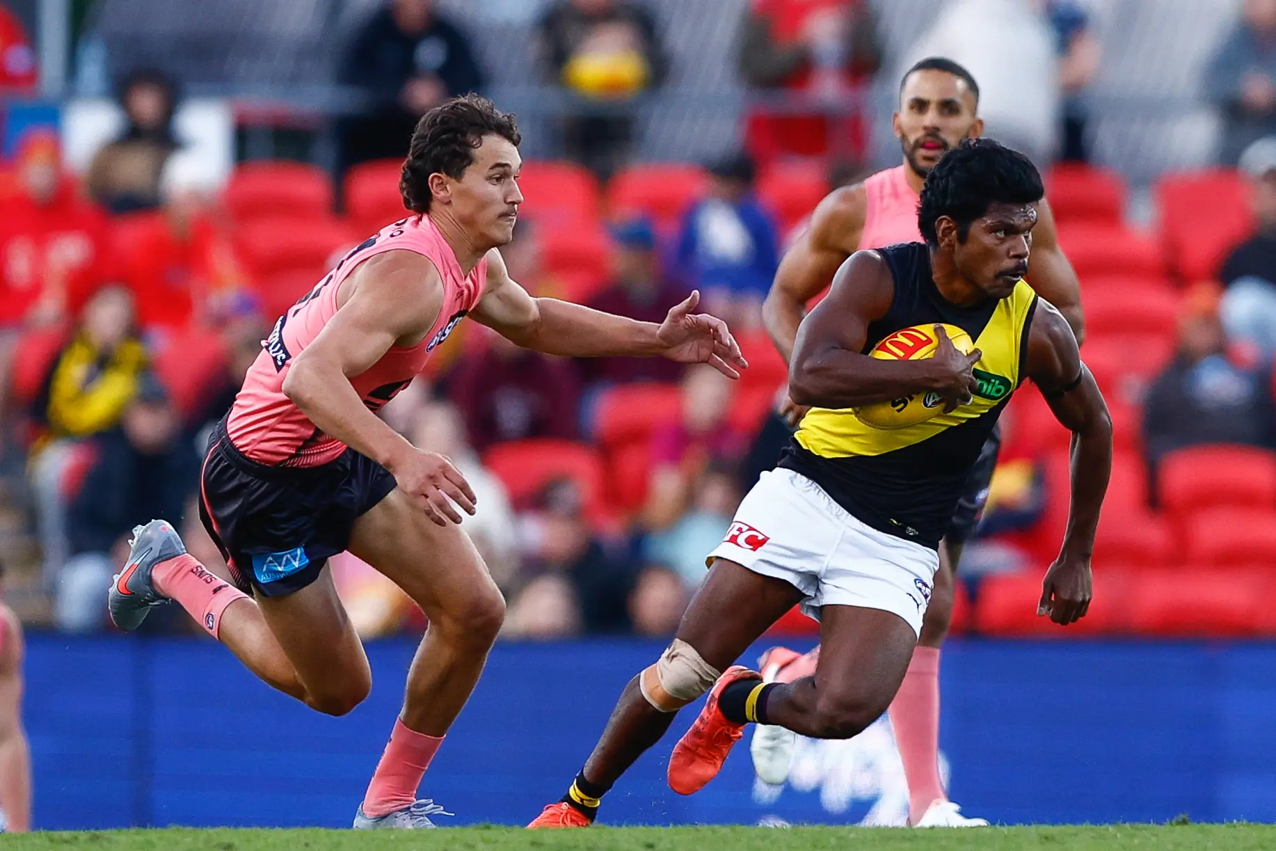GOLD COAST, AUSTRALIA - AUGUST 02: Maurice Rioli of the Tigers in action during the 2025 AFL Round 21 match between the Gold Coast Suns and the Richmond Tigers at People First Stadium on August 2, 2025 in the Gold Coast, Australia. (Photo by Russell Freeman/AFL Photos via Getty Images)