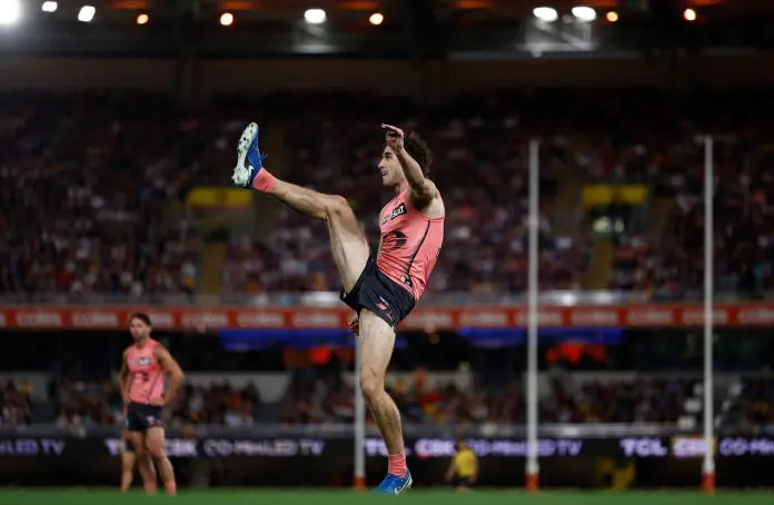 BRISBANE, AUSTRALIA - SEPTEMBER 13: Ben King of the Suns kicks the ball during the AFL Second Semi Final match between the Brisbane Lions and the Gold Coast Suns at the Gabba on September 13, 2025 in Brisbane, Australia. (Photo by Michael Willson/AFL Photos via Getty Images)
