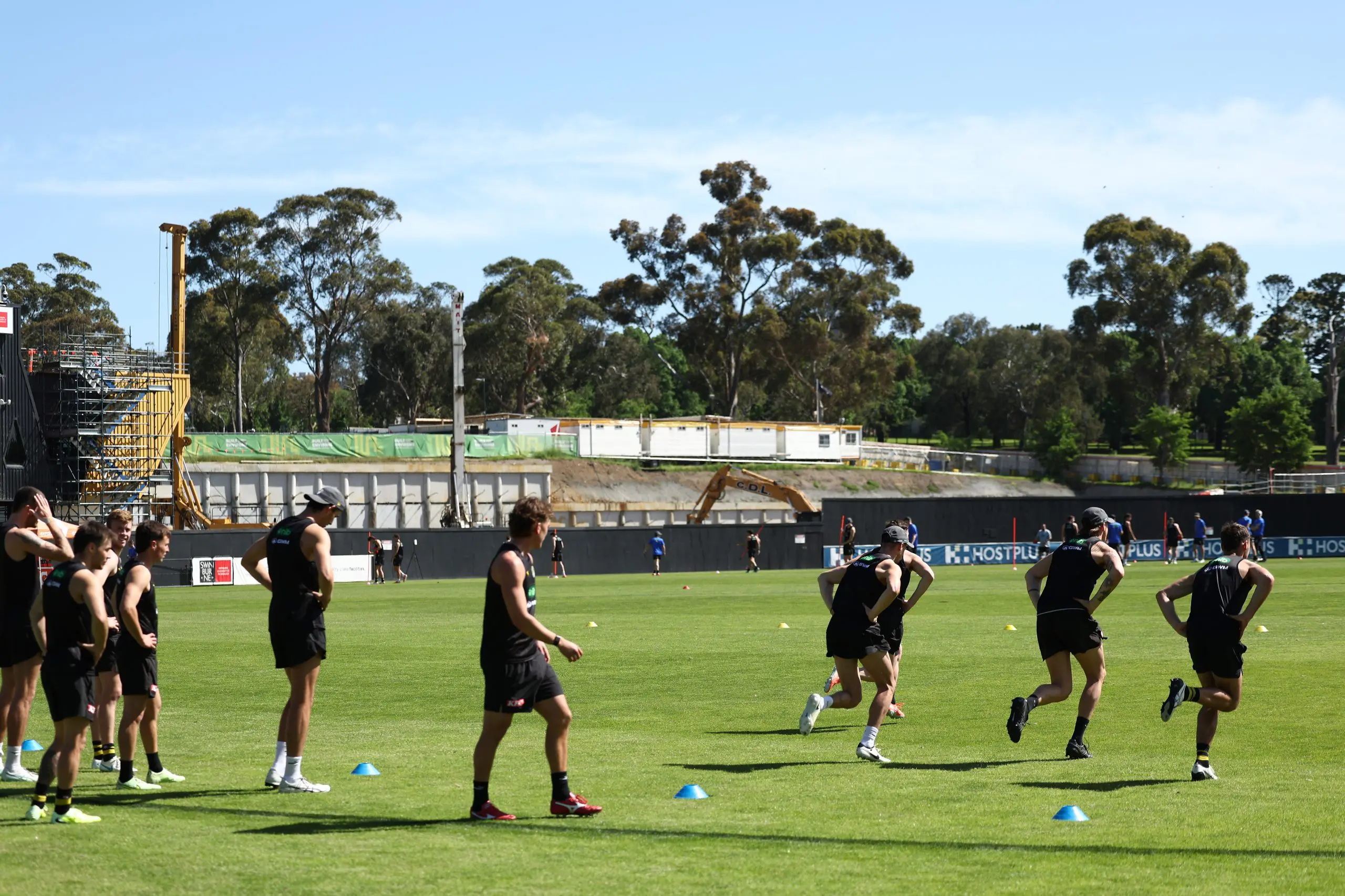 MELBOURNE, AUSTRALIA - NOVEMBER 14: Richmond with construction site for new facility in the background during the Richmond Tigers 2026 Pre-Season at Punt Road Oval on November 14, 2025 in Melbourne, Australia. (Photo by James Wiltshire/AFL Photos via Getty Images)