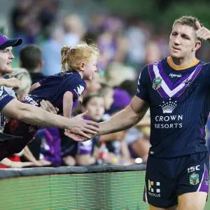 MELBOURNE, AUSTRALIA - MARCH 22: Ryan Hoffman of the Storm celebrates the win with fans during the round three NRL match between the Melbourne Storm and the North Queensland Cowboys at AAMI Park on March 22, 2018 in Melbourne, Australia. (Photo by Michael Dodge/Getty Images)
