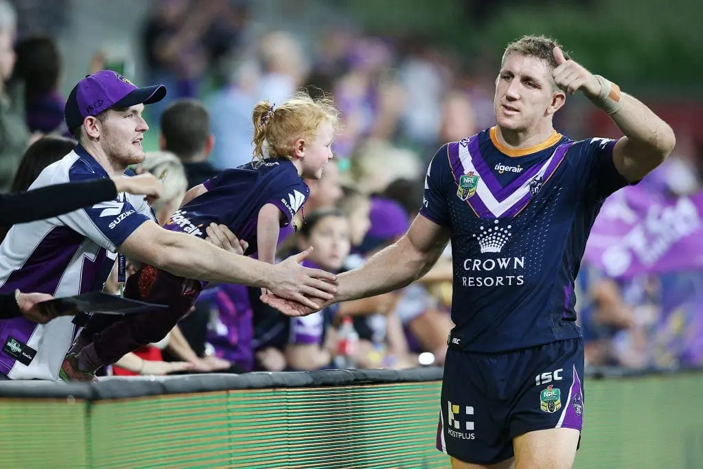 MELBOURNE, AUSTRALIA - MARCH 22: Ryan Hoffman of the Storm celebrates the win with fans during the round three NRL match between the Melbourne Storm and the North Queensland Cowboys at AAMI Park on March 22, 2018 in Melbourne, Australia. (Photo by Michael Dodge/Getty Images)