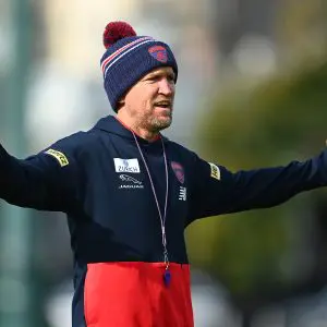MELBOURNE, AUSTRALIA - MAY 24: Darren Burgess signals to the players during a Melbourne Demons AFL training session at Gosch's Paddock on May 24, 2021 in Melbourne, Australia. (Photo by Quinn Rooney/Getty Images)