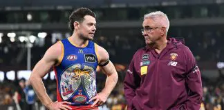 MELBOURNE, AUSTRALIA - MAY 26: Lachie Neale of the Lions and Chris Fagan, Senior Coach of the Lions look dejected after the round 11 AFL match between Hawthorn Hawks and Brisbane Lions at Marvel Stadium, on May 26, 2024, in Melbourne, Australia. (Photo by Daniel Pockett/Getty Images)