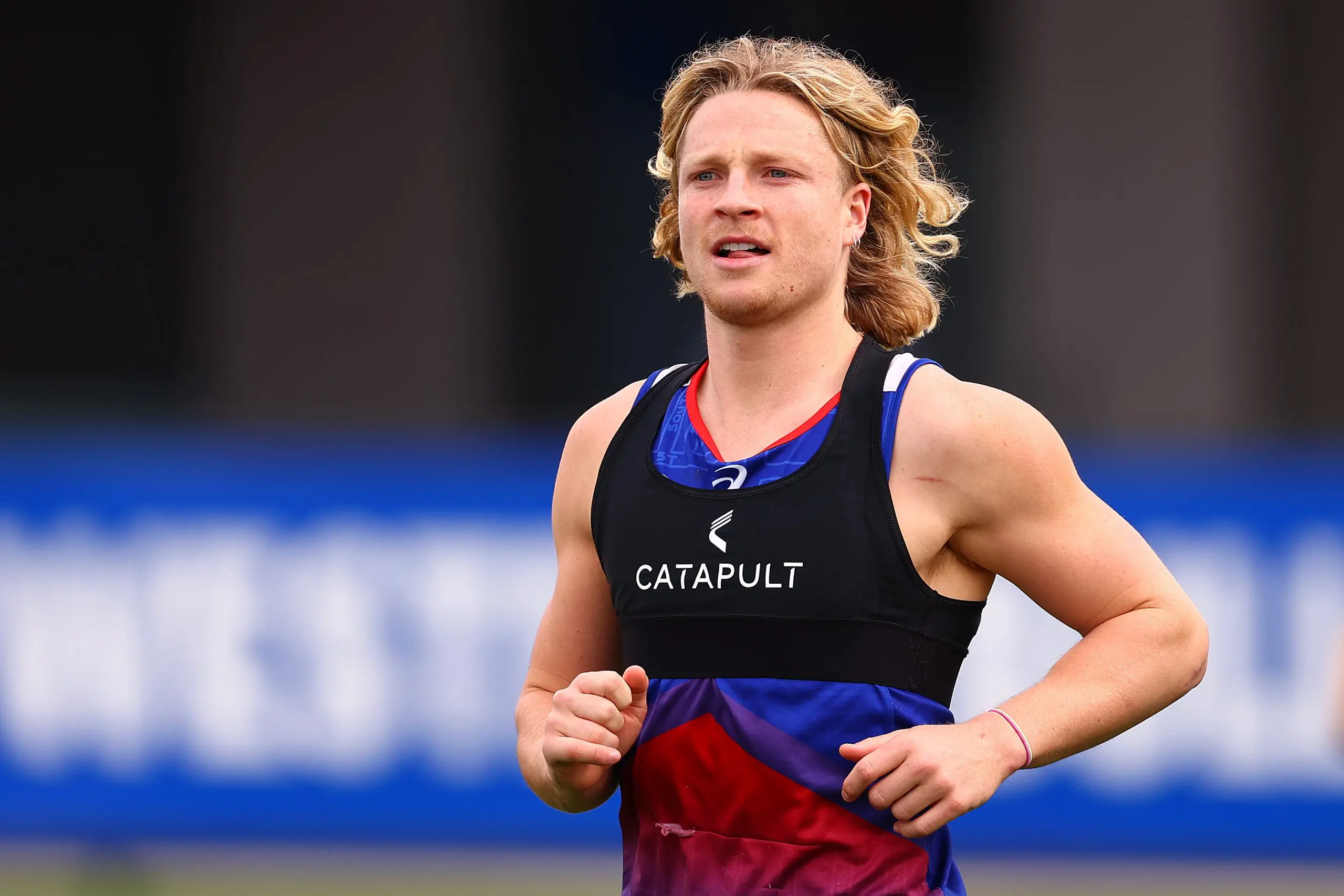 MELBOURNE, AUSTRALIA - AUGUST 27: Cody Weightman of the Bulldogs trains during a Western Bulldogs AFL training session at Whitten Oval on August 27, 2024 in Melbourne, Australia. (Photo by Morgan Hancock/Getty Images)