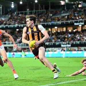 LAUNCESTON, AUSTRALIA - MARCH 29: Will Day of the Hawks runs the ball during the round 3 AFL match between the 
Hawthorn Hawks and GWS Giants at University of Tasmania Stadium, on March 29, 2025, in Launceston, Australia. (Photo by Steve Bell/Getty Images)