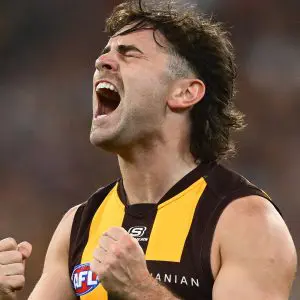 MELBOURNE, AUSTRALIA - APRIL 21: Nick Watson of the Hawks reacts after missing a shot on goal during the round six AFL match between Geelong Cats and Hawthorn Hawks at Melbourne Cricket Ground, on April 21, 2025, in Melbourne, Australia. (Photo by Quinn Rooney/Getty Images)