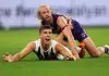 PERTH, AUSTRALIA - MAY 08: Nick Daicos of the Magpies looks to the umpire after marking the ball against Corey Wagner of the Dockers during the round nine AFL match between Fremantle Dockers and Collingwood Magpies at Optus Stadium, on May 08, 2025, in Perth, Australia. (Photo by Paul Kane/Getty Images)