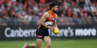 SYDNEY, AUSTRALIA - MAY 31: Lachie Ash of the Giants runs the ball during the round 12 AFL match between Greater Western Sydney Giants and Richmond Tigers at ENGIE Stadium on May 31, 2025 in Sydney, Australia. (Photo by Jason McCawley/Getty Images)