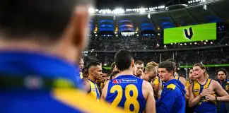 PERTH, AUSTRALIA - JULY 19: Andrew McQualter, Senior Coach of the Eagles addresses the players at the break during the 2025 AFL Round 19 match between the West Coast Eagles and the Richmond Tigers at Optus Stadium on July 19, 2025 in Perth, Australia. (Photo by Daniel Carson/AFL Photos via Getty Images)