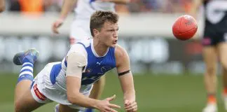 Victorian club linked to North Melbourne youngster: AFL trade news CANBERRA, AUSTRALIA - AUGUST 10: Zane Duursma of the Kangaroos handballs during the round 22 AFL match between GWS Giants and North Melbourne Kangaroos at Manuka Oval on August 10, 2025 in Canberra, Australia. (Photo by Darrian Traynor/AFL Photos/via Getty Images)