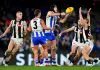 AFL Pre-season teams: AAMI Community Series MELBOURNE, AUSTRALIA - JUNE 16: Tristan Xerri of the Kangaroos handballs during the round 14 AFL match between North Melbourne Kangaroos and Collingwood Magpies at Marvel Stadium, on June 16, 2024, in Melbourne, Australia. (Photo by Josh Chadwick/AFL Photos/Getty Images)