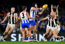 AFL Pre-season teams: AAMI Community Series MELBOURNE, AUSTRALIA - JUNE 16: Tristan Xerri of the Kangaroos handballs during the round 14 AFL match between North Melbourne Kangaroos and Collingwood Magpies at Marvel Stadium, on June 16, 2024, in Melbourne, Australia. (Photo by Josh Chadwick/AFL Photos/Getty Images)
