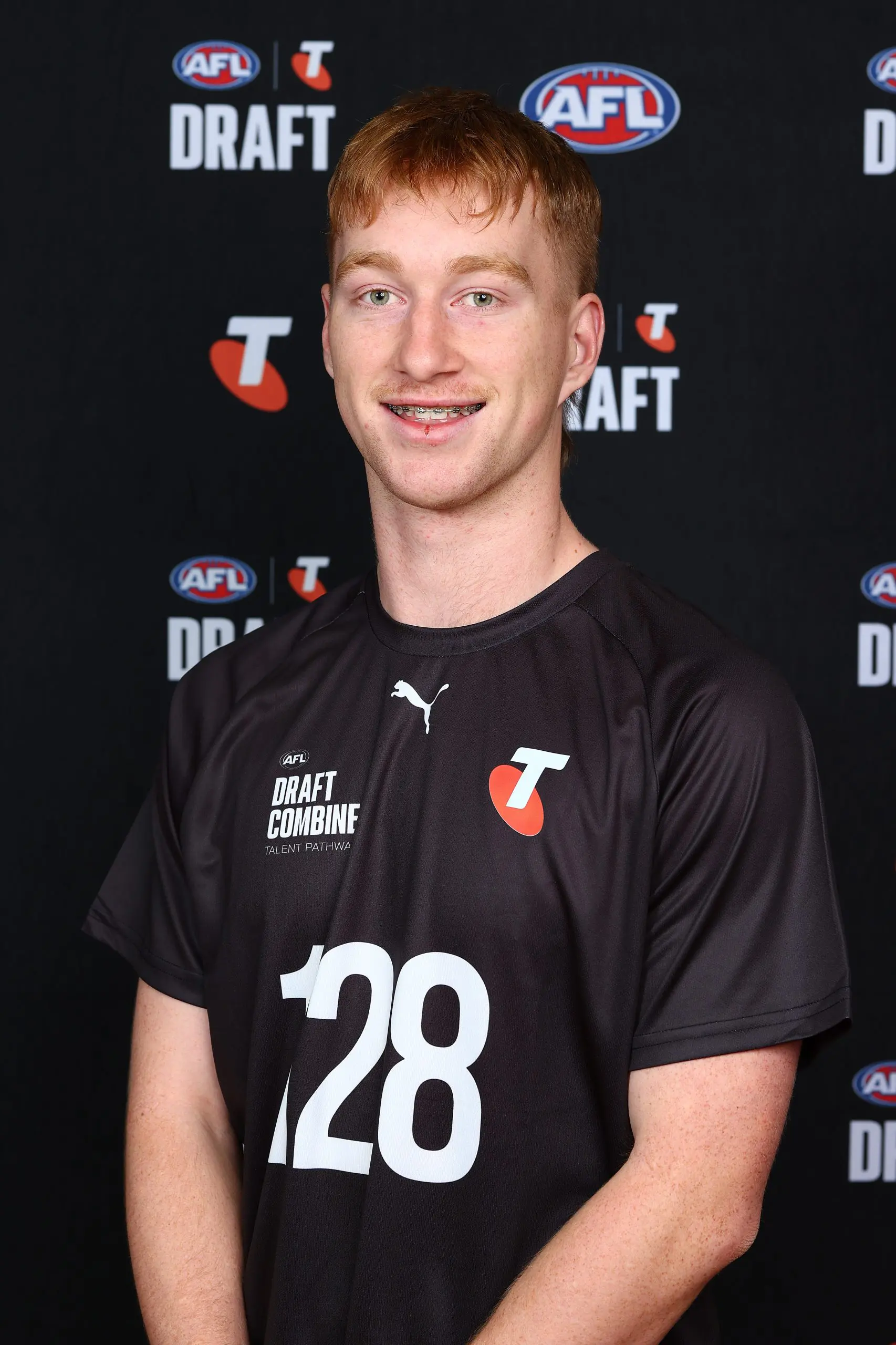 MELBOURNE, AUSTRALIA - OCTOBER 05: Callum Smith poses during the Telstra AFL Draft Combine Headshots Session at the State Netball and Hockey Centre on October 05, 2025 in Melbourne, Australia. (Photo by Graham Denholm/AFL Photos/via Getty Images)