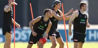 Richmond pair sign crucial extensions MELBOURNE, AUSTRALIA - NOVEMBER 14: Taj Hotton of the Tigers handpasses the ball during the Richmond Tigers 2026 Pre-Season at Punt Road Oval on November 14, 2025 in Melbourne, Australia. (Photo by James Wiltshire/AFL Photos via Getty Images)