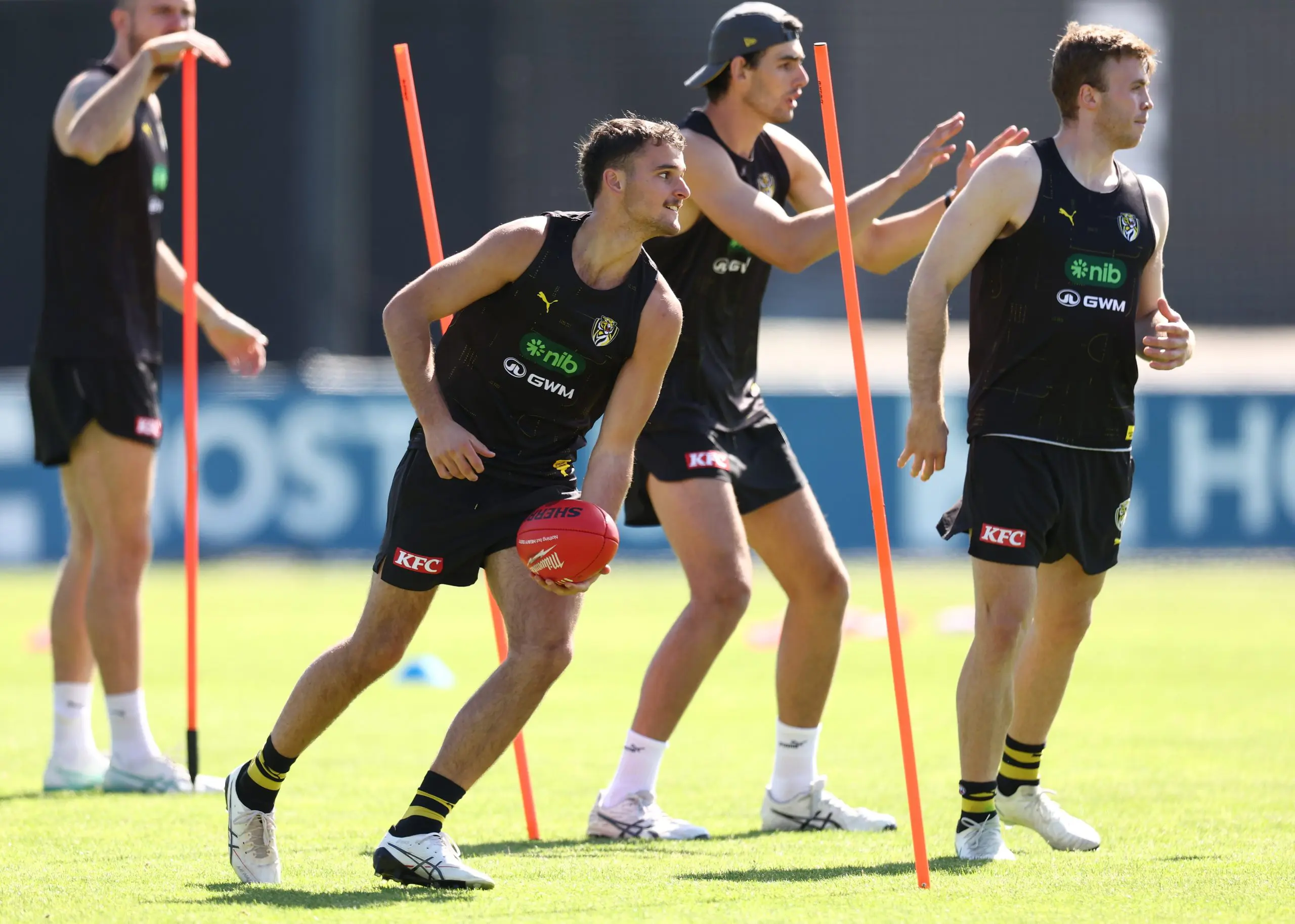 MELBOURNE, AUSTRALIA - NOVEMBER 14: Taj Hotton of the Tigers handpasses the ball during the Richmond Tigers 2026 Pre-Season at Punt Road Oval on November 14, 2025 in Melbourne, Australia. (Photo by James Wiltshire/AFL Photos via Getty Images)
