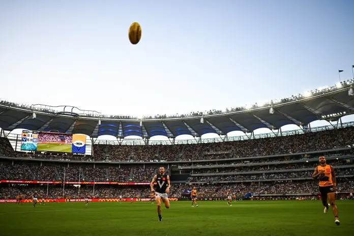 PERTH, AUSTRALIA - FEBRUARY 14: Sam Collins of Victoria chases the ball during the 2026 AFL Origin match between Western Australia and Victoria at Optus Stadium on February 14, 2026 in Perth, Australia. (Photo by Daniel Carson/AFL Photos via Getty Images)