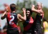 Essendon young gun makes statement, star midfielder back to best in practice match win over Richmond MELBOURNE, AUSTRALIA - FEBRUARY 20: Hussien El Achkar of the Bombers celebrates a goal during the 2026 AFL match simulation between the Essendon Bombers and the Richmond Tigers at the NEC Hangar on February 20, 2026 in Melbourne, Australia. (Photo by James Wiltshire/AFL Photos via Getty Images)