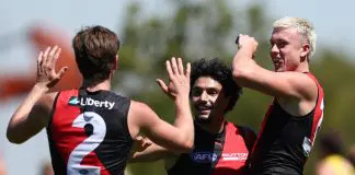 Essendon young gun makes statement, star midfielder back to best in practice match win over Richmond MELBOURNE, AUSTRALIA - FEBRUARY 20: Hussien El Achkar of the Bombers celebrates a goal during the 2026 AFL match simulation between the Essendon Bombers and the Richmond Tigers at the NEC Hangar on February 20, 2026 in Melbourne, Australia. (Photo by James Wiltshire/AFL Photos via Getty Images)