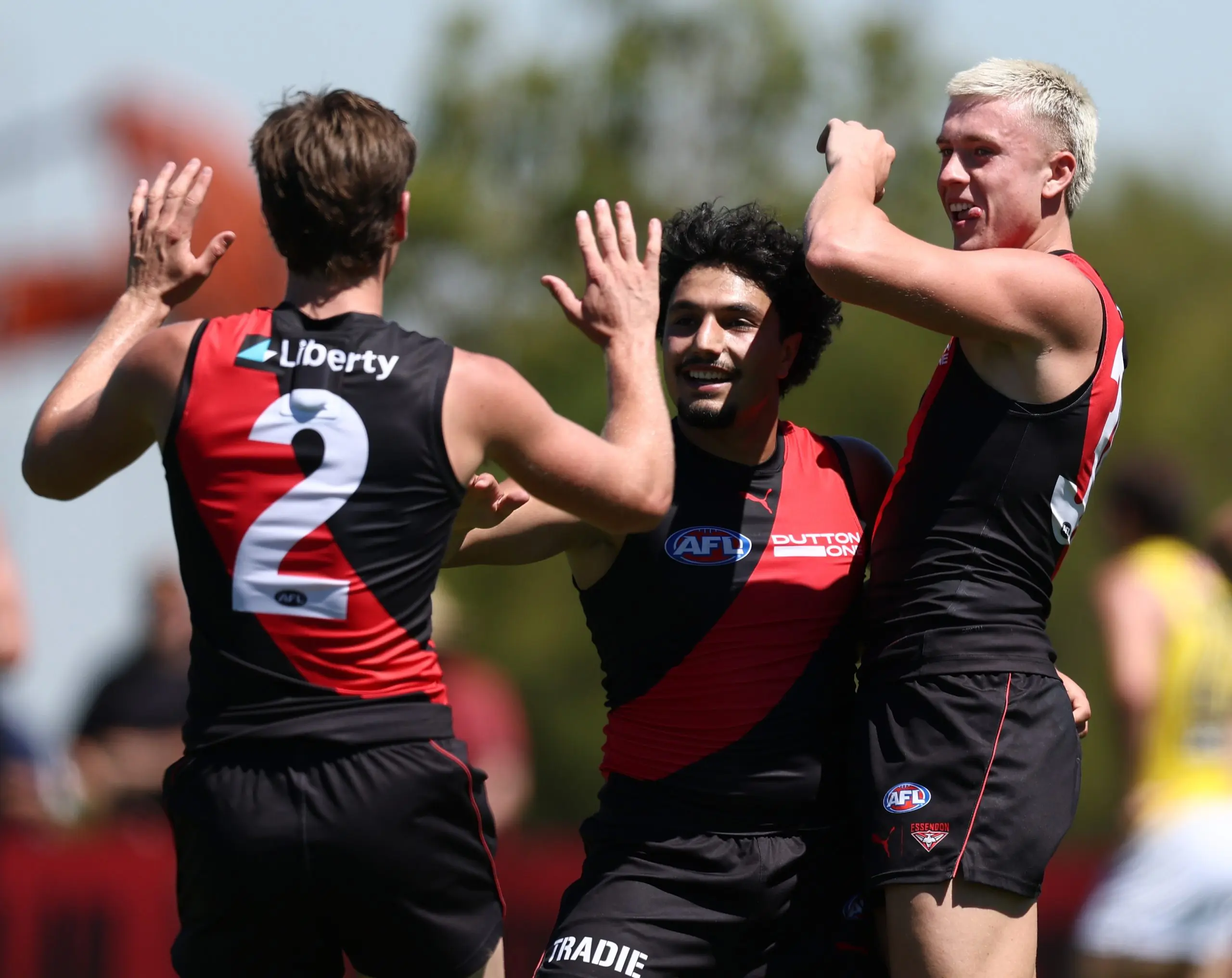 MELBOURNE, AUSTRALIA - FEBRUARY 20: Hussien El Achkar of the Bombers celebrates a goal during the 2026 AFL match simulation between the Essendon Bombers and the Richmond Tigers at the NEC Hangar on February 20, 2026 in Melbourne, Australia. (Photo by James Wiltshire/AFL Photos via Getty Images)