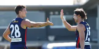 Melbourne recruit, North Melbourne defender ruled out of match sim MELBOURNE, AUSTRALIA - FEBRUARY 20: Brody Mihocek of the Demons celebrates a goal during the 2026 AFL match simulation between the Melbourne Demons and the North Melbourne Kangaroos at Casey Fields on February 20, 2026 in Melbourne, Australia. (Photo by James Wiltshire/AFL Photos via Getty Images)
