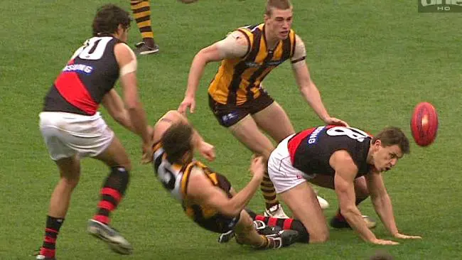 Matthew Lloyd shortly after collecting Brad Sewell in 2009.