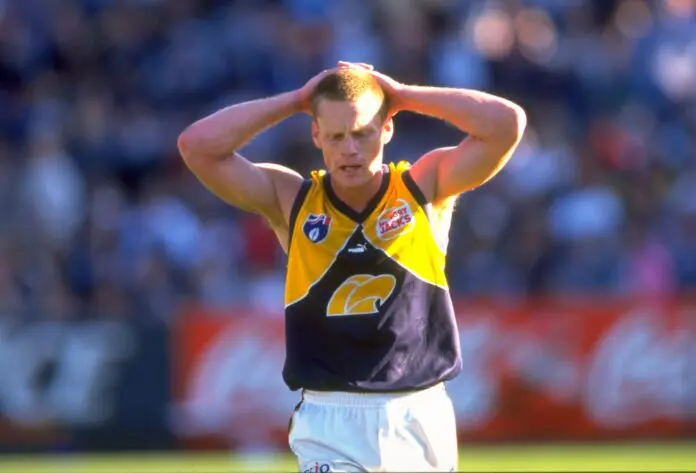 11 Sep 1999:  Guy McKenna of West Coast in action during the AFL First Preliminary Semi Final between the Carlton Blues and the West Coast Eagles played at the MCG, Melbourne, Australia. The game finished in a 124 to 70 win for the Blues.  Mandatory Credit: Stuart Milligan /Allsport