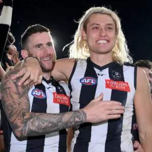 MELBOURNE, AUSTRALIA - SEPTEMBER 07: Jeremy Howe and Darcy Moore of the Magpies celebrate winning the AFL First Qualifying Final match between Collingwood Magpies and Melbourne Demons at Melbourne Cricket Ground, on September 07, 2023, in Melbourne, Australia. (Photo by Quinn Rooney/Getty Images)