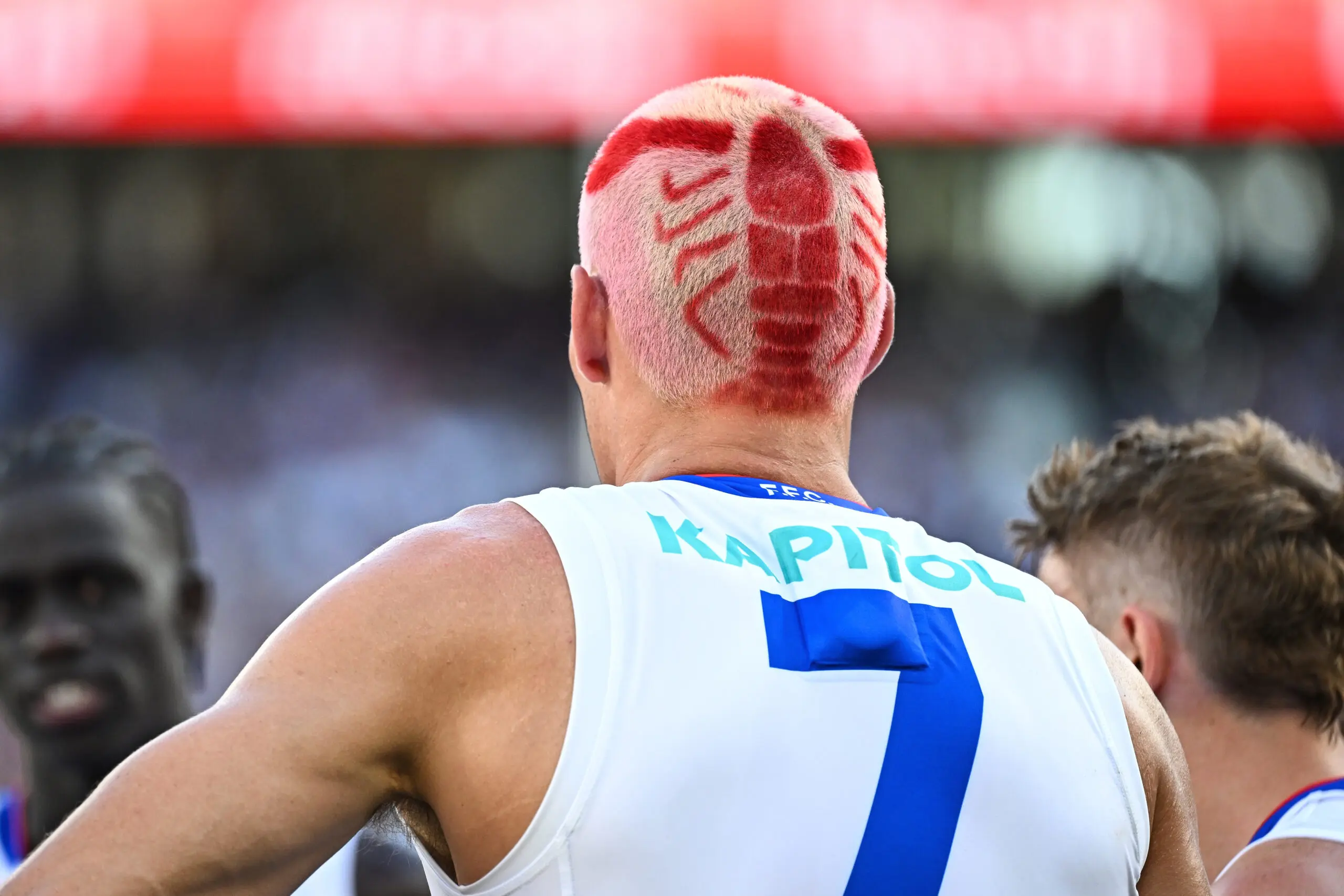 PERTH, AUSTRALIA - APRIL 06: Rory Lobb of the Bulldogs with a Lobster hair cut during the 2025 AFL Round 04 match between the Fremantle Dockers and the Western Bulldogs at Optus Stadium on April 6, 2025 in Perth, Australia. (Photo by Daniel Carson/AFL Photos via Getty Images)