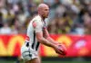 MELBOURNE, AUSTRALIA - JULY 27: Tom Mitchell of the Magpies kicks during the round 20 AFL match between Richmond Tigers and Collingwood Magpies at Melbourne Cricket Ground on July 27, 2025 in Melbourne, Australia. (Photo by Daniel Pockett/Getty Images)