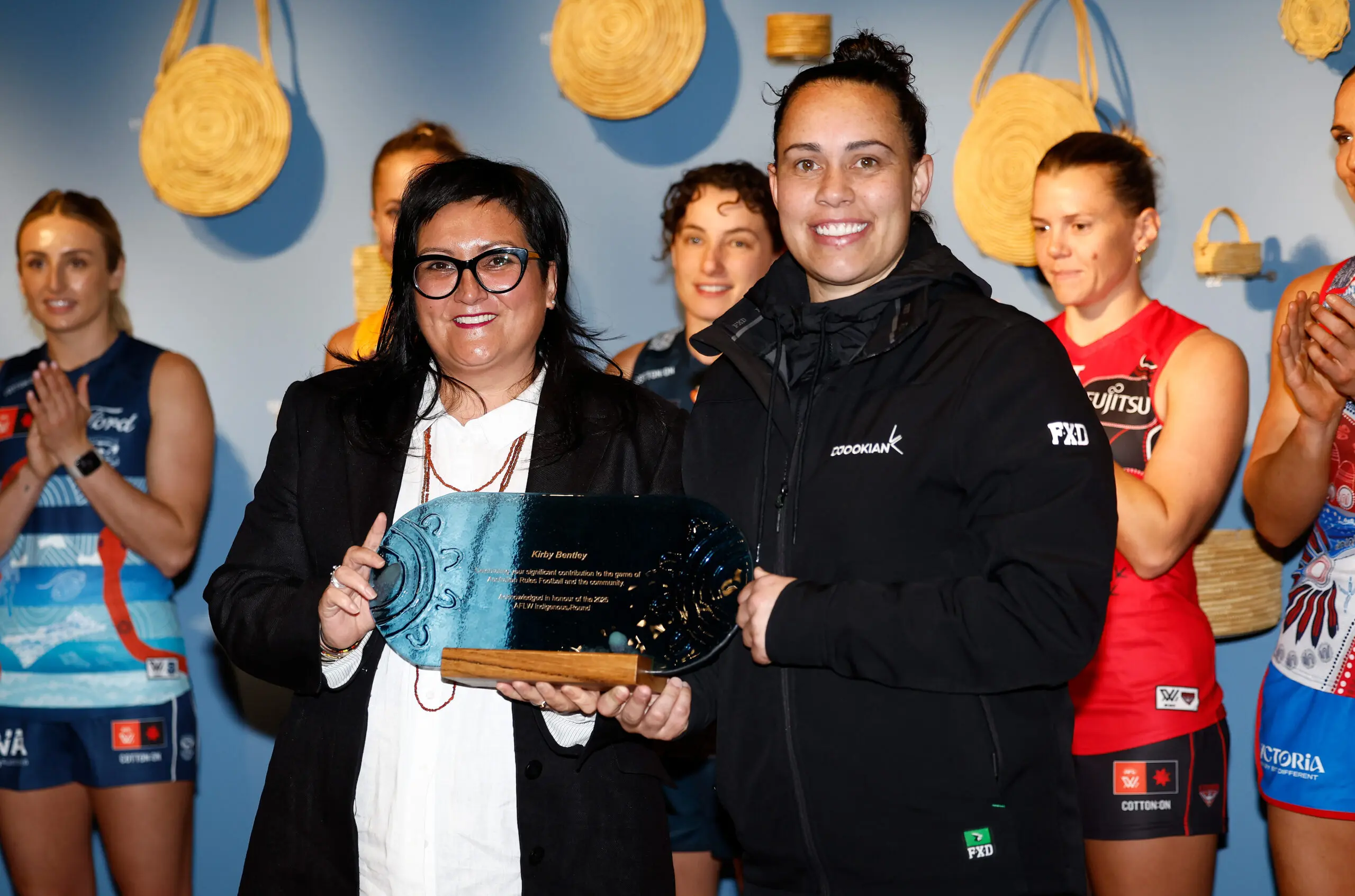 MELBOURNE, AUSTRALIA - AUGUST 26: Taryn Lee, AFL General Manager, First Nations Engagement and Inclusion announces 2025 AFLW Indigenous Round honouree Kirby Bentley during the 2025 AFLW Indigenous Round Media Opportunity at the Koorie Heritage Trust on August 26, 2025 in Melbourne, Australia. (Photo by Michael Willson/AFL Photos via Getty Images)