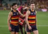 ADELAIDE, AUSTRALIA - SEPTEMBER 12: 
Josh Rachele and Zac Taylor of the Crows after their loss during the AFL First Semi Final match between the Adelaide Crows and the Hawthorn Hawks at Adelaide Oval on September 12, 2025 in Adelaide, Australia. (Photo by James Elsby/AFL Photos via Getty Images)