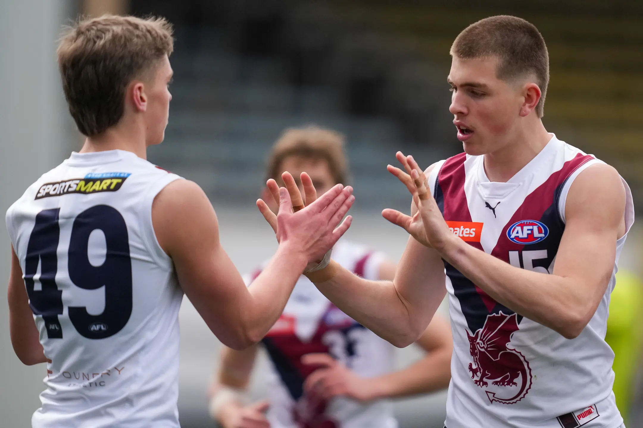 MELBOURNE, AUSTRALIA - SEPTEMBER 20: Oliver Griffin of the Sandringham Dragons (Right) celebrates after scoring a goal during the Coates Talent League Boys Grand Final between Eastern Ranges and Sandringham Dragons at Ikon Park on September 20, 2025 in Melbourne, Australia. (Photo by Asanka Ratnayake/AFL Photos/via Getty Images)