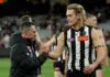 MELBOURNE, AUSTRALIA - SEPTEMBER 20: Craig McRae, Senior Coach of the Magpies and Darcy Moore of the Magpies look dejected after losing the AFL Preliminary Final match between Collingwood Magpies and Brisbane Lions at Melbourne Cricket Ground on September 20, 2025 in Melbourne, Australia. (Photo by Robert Cianflone/Getty Images)