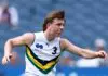 MELBOURNE, AUSTRALIA - SEPTEMBER 27: Arki Butler of Team Boak kicks during the Marsh AFL National Futures Boys match between Team Boak and Team Docherty at Melbourne Cricket Ground, on September 27, 2025 in Melbourne, Australia. (Photo by Josh Chadwick/AFL Photos/via Getty Images)