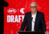 MELBOURNE, AUSTRALIA - NOVEMBER 20: Greg Swann, Executive General Manager Football Performance of the AFL reads out picks during the 2025 Telstra AFL Draft at Marvel Stadium on November 20, 2025 in Melbourne, Australia. (Photo by Michael Willson/AFL Photos via Getty Images)