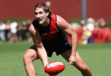 “He’ll love it”: Essendon debutant ready for baptism of fire MELBOURNE, AUSTRALIA - FEBRUARY 20: Dyson Sharp of the Bombers handpasses the ball during the 2026 AFL match simulation between the Essendon Bombers and the Richmond Tigers at the NEC Hangar on February 20, 2026 in Melbourne, Australia. (Photo by James Wiltshire/AFL Photos via Getty Images)